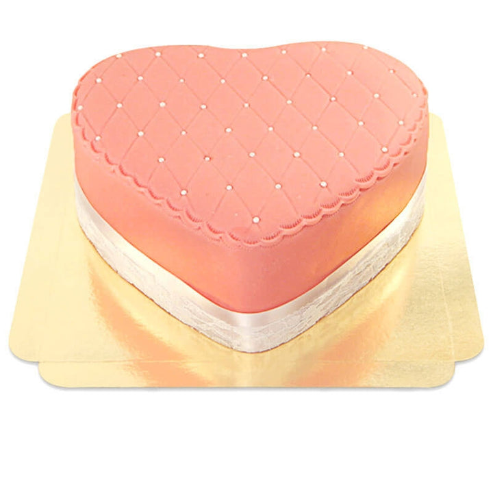 Pinke Deluxe Valentinstagstorte in Herzform - doppelte Höhe