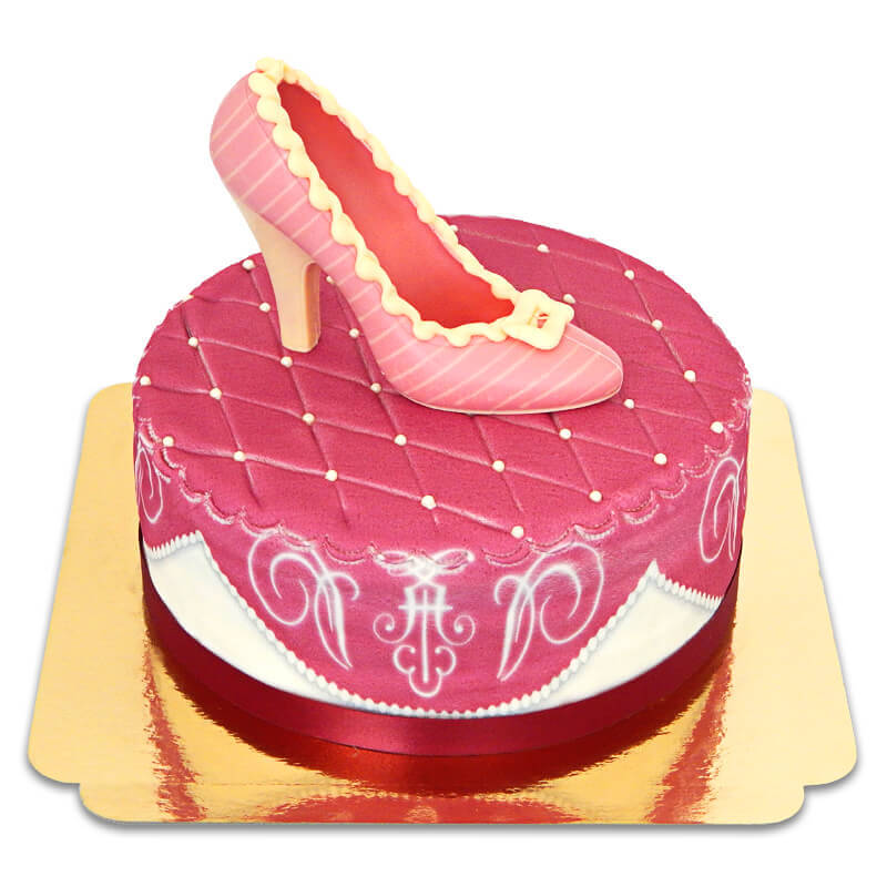 Pinke Deluxe Torte mit Schokoladenschuh und Band